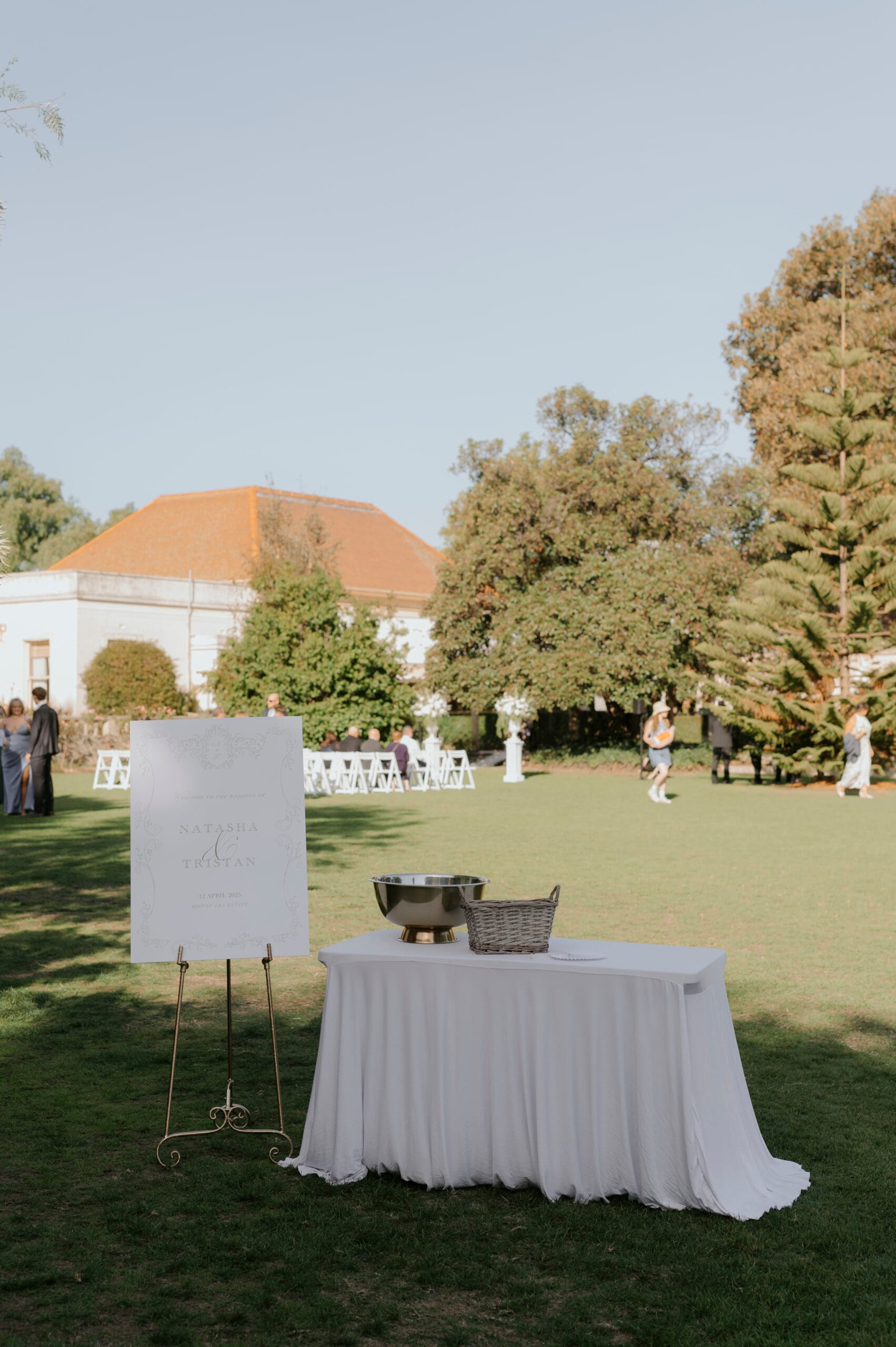 Standard signing table with cloth and Gold easel with swirl detail