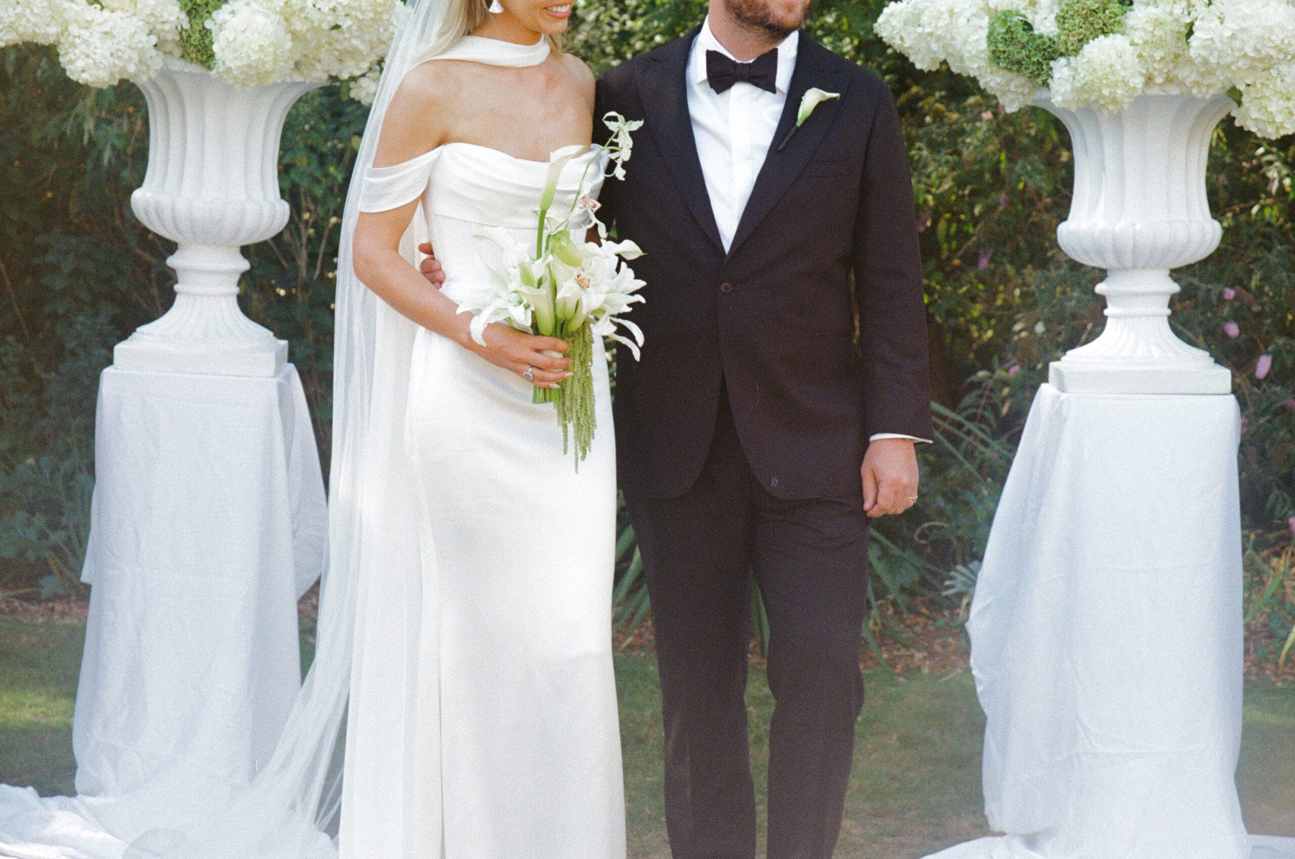 Traditional Fluted Urns and Pedestals with fresh florals at Rippon Lea