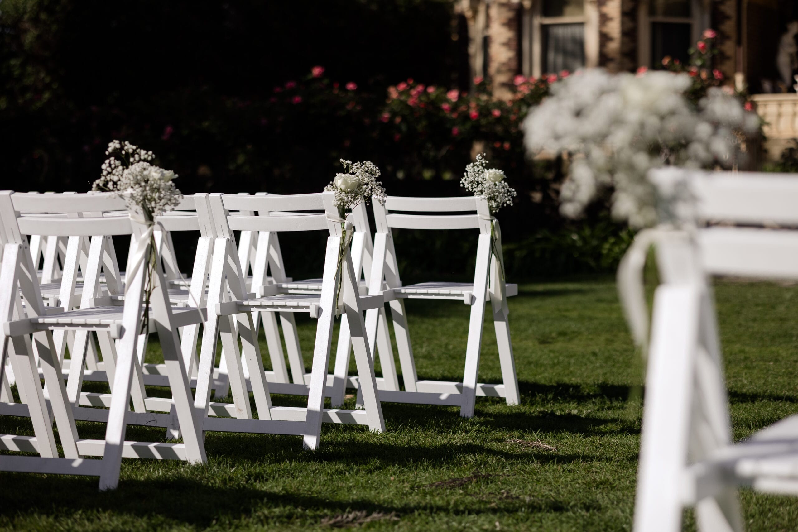 White Wooden Chairs at Rippon Lea Estate with fresh florals