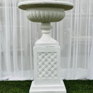 Textured White round urn on textured criss-cross small pedestal