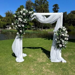 Pretty in pink silk floral arch arrangement