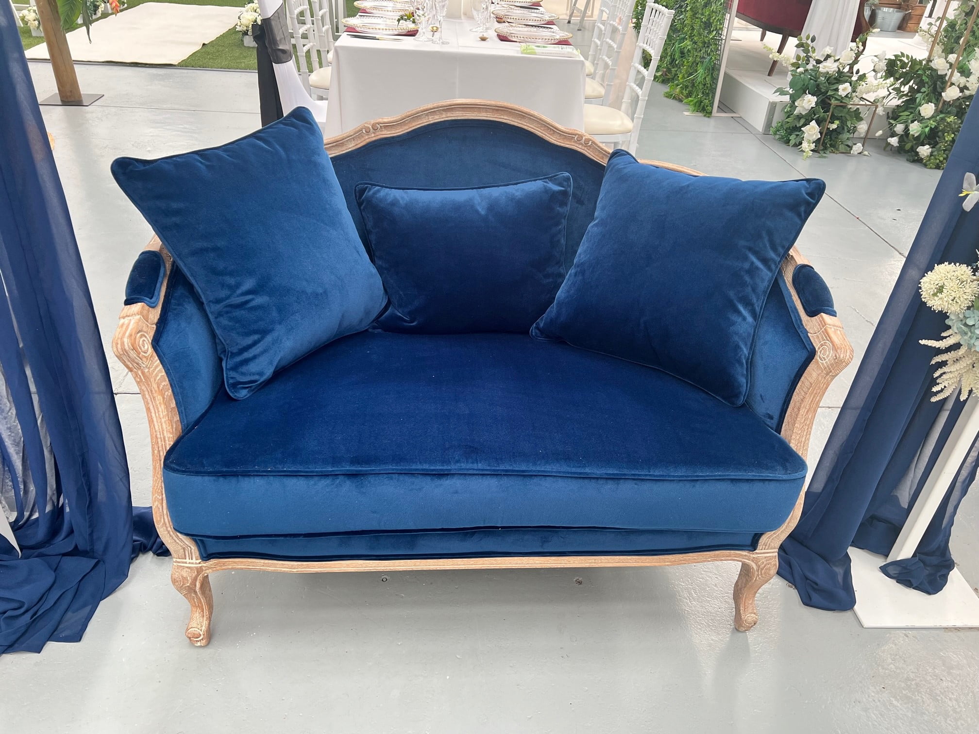Royal blue velvet 2-seater couch - Weddings of Distinction