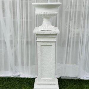 Textured medium round urn on textured white pedestal