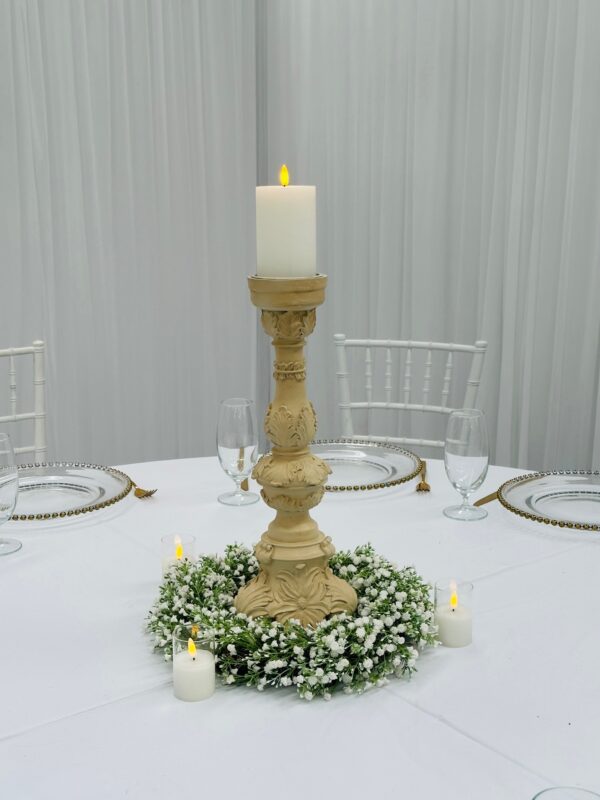 Antique sepia candlestick with baby's breath wreath