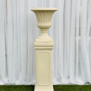 Traditional sandstone fluted urn and pedestal
