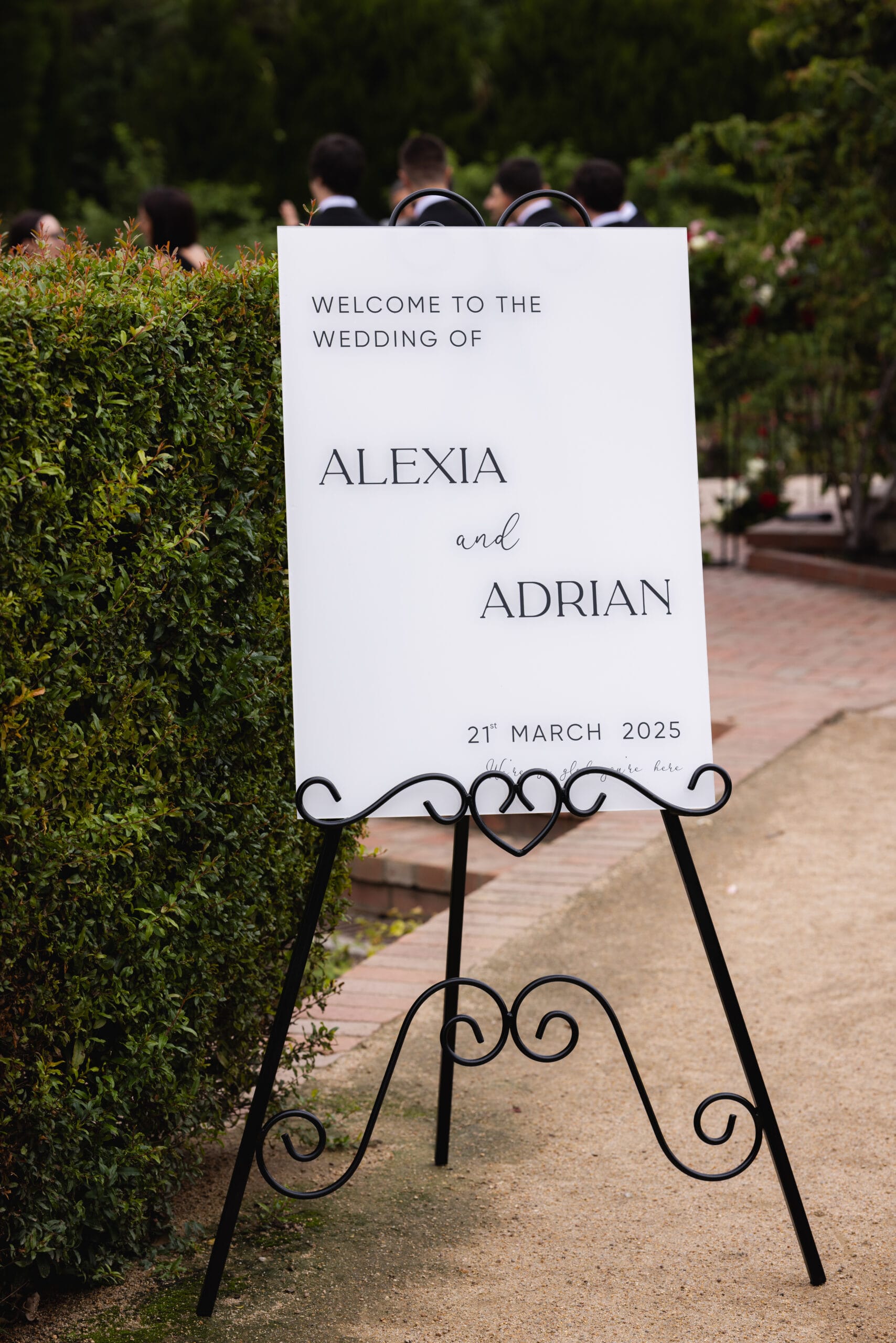 Wrought Iron Easel - Black with custom sign provided by clients