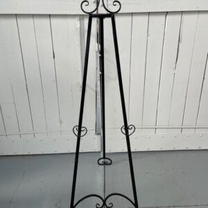 Black easel with swirl detail