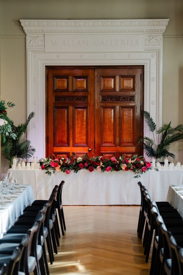 Pink, red and beige silk floral table runner