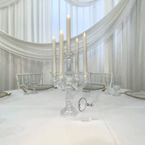 Clear Acrylic arched table number 1 on table